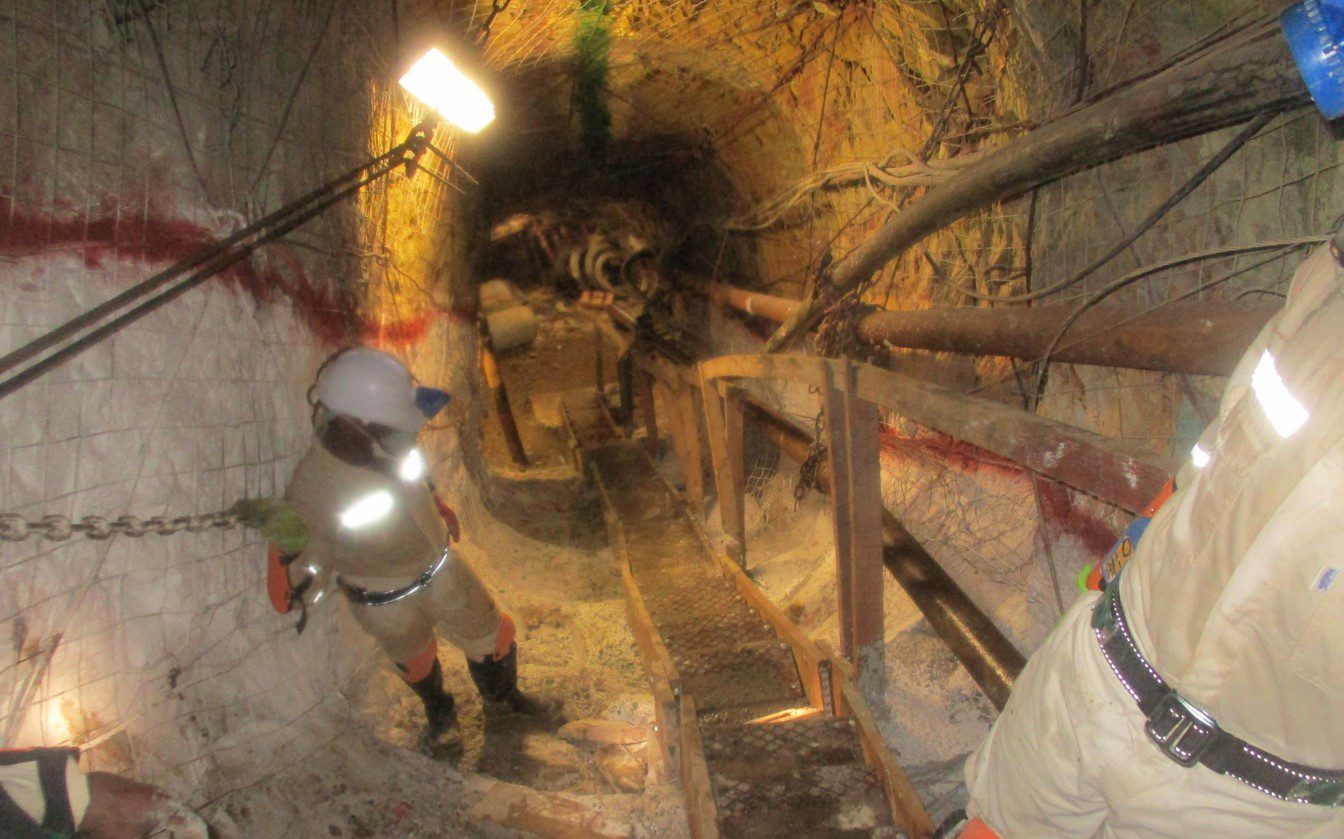Adjustable Stairway providing safe access down a steep underground travelling way