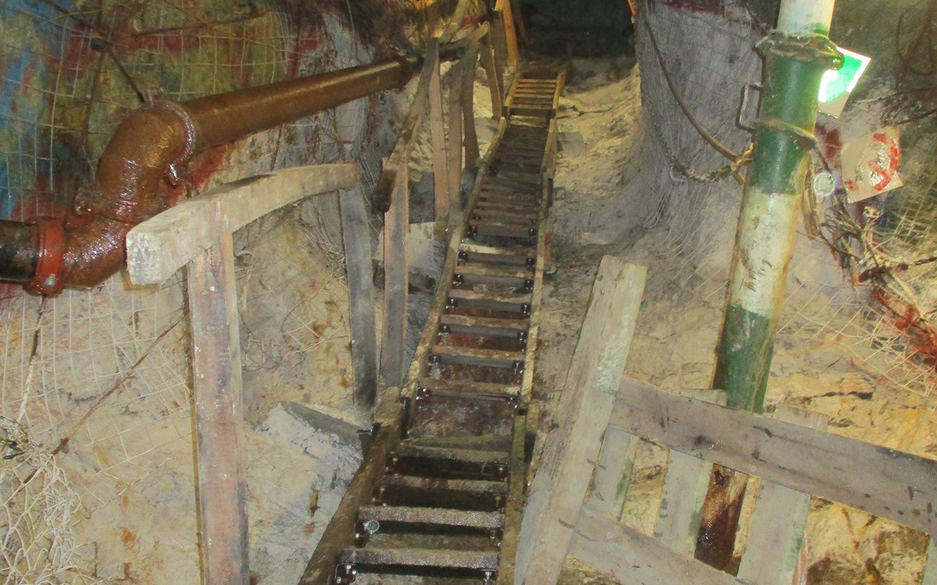 Adjustable Stairway installed alongside pipework in an underground excavation