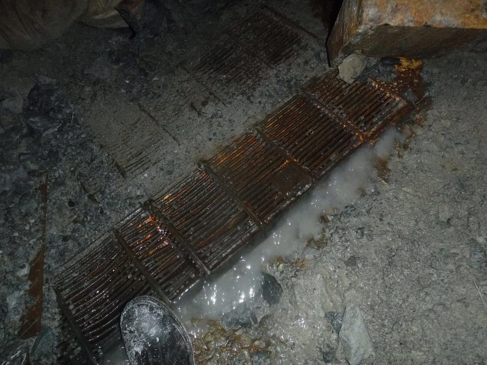 Water Weir Eliminator installed in an underground gully, draining water away from the ore pass