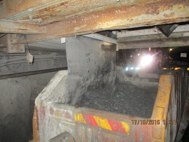 Close-up of the spillage mat fixings on the box front platform underground